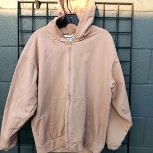 The Giving Movement zip-up sweater